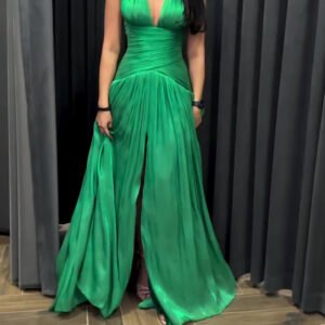 Emerald Green Plunging Neckline Gown With Pleated Skirt And Side Slit